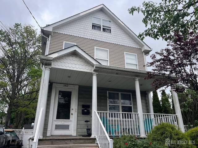 142 Joyce Kilmer Ave, New Brunswick, NJ 08901 - view of front facade featuring covered porch