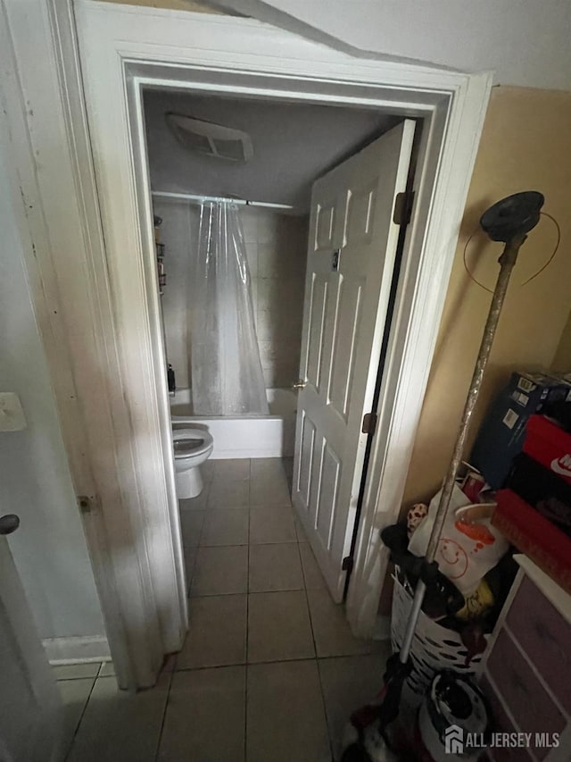 142 Joyce Kilmer Ave, New Brunswick, NJ 08901 - full bath with tile patterned floors, shower / bath combination with curtain, and toilet