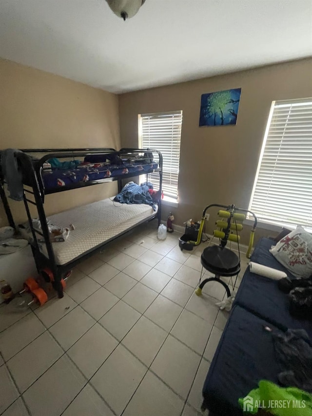 142 Joyce Kilmer Ave, New Brunswick, NJ 08901 - tiled bedroom with baseboards