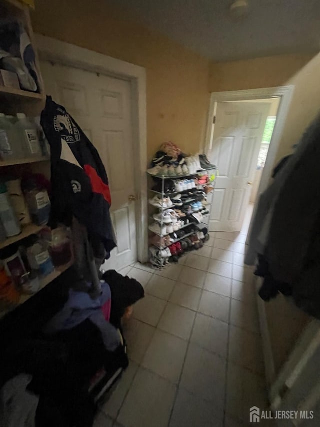 142 Joyce Kilmer Ave, New Brunswick, NJ 08901 - corridor featuring tile patterned flooring