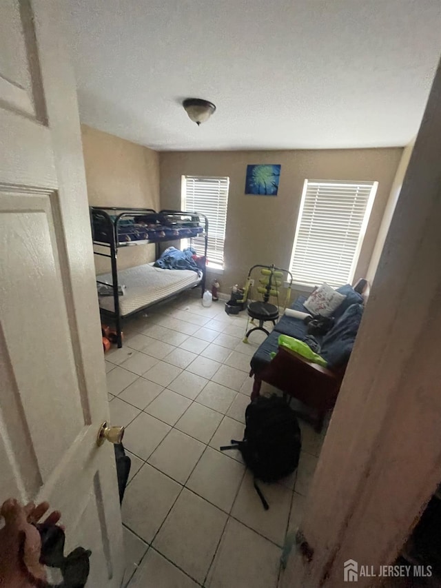 142 Joyce Kilmer Ave, New Brunswick, NJ 08901 - bedroom featuring light tile patterned floors