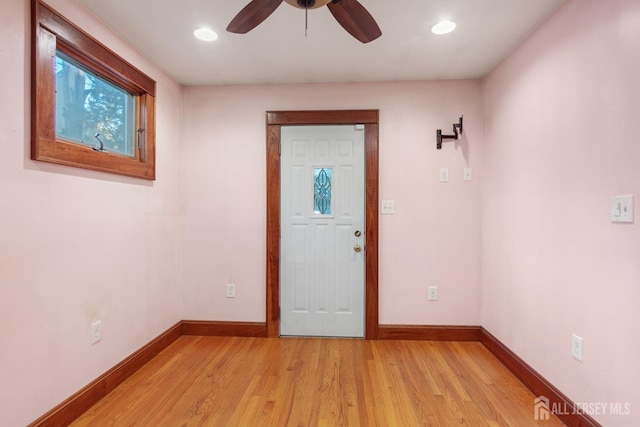 entrance foyer featuring ceiling fan and light wood-type flooring