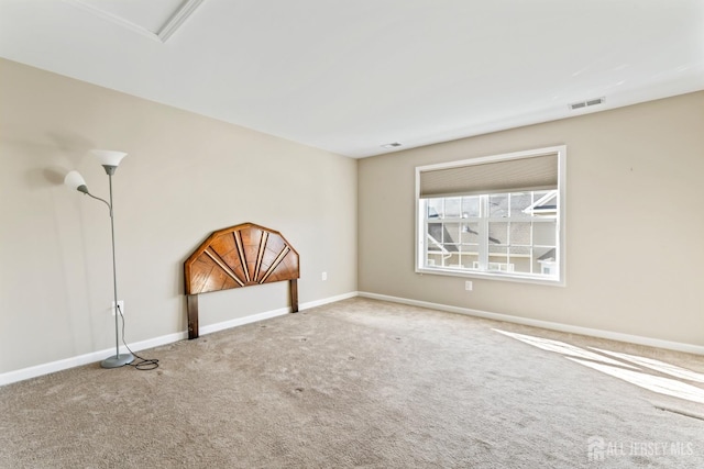 view of carpeted spare room