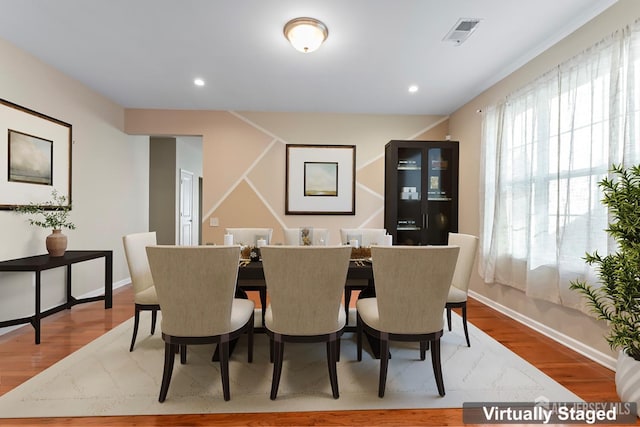 dining room featuring wood-type flooring