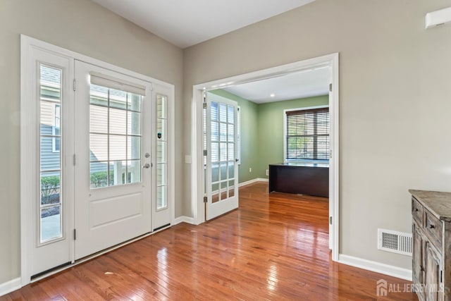 entryway featuring a wealth of natural light and light wood-type flooring