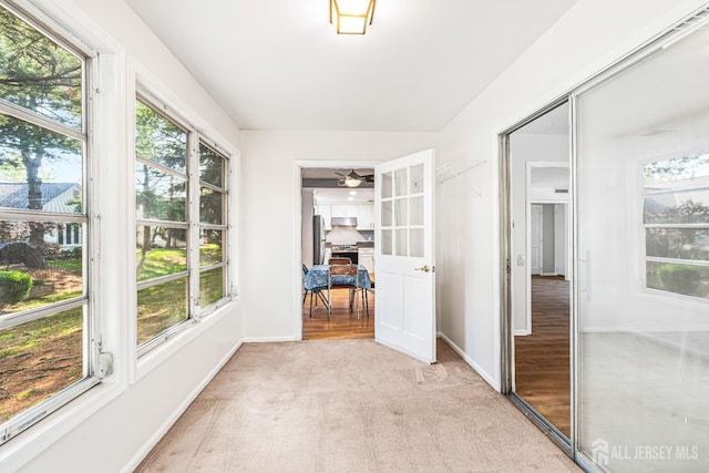 298-B Sharon Way, Monroe, NJ 08831 - unfurnished sunroom featuring carpet flooring and baseboards