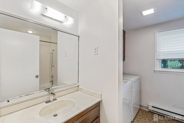 298-B Sharon Way, Monroe, NJ 08831 - bathroom featuring a baseboard heating unit, independent washer and dryer, vanity, and  shower combination