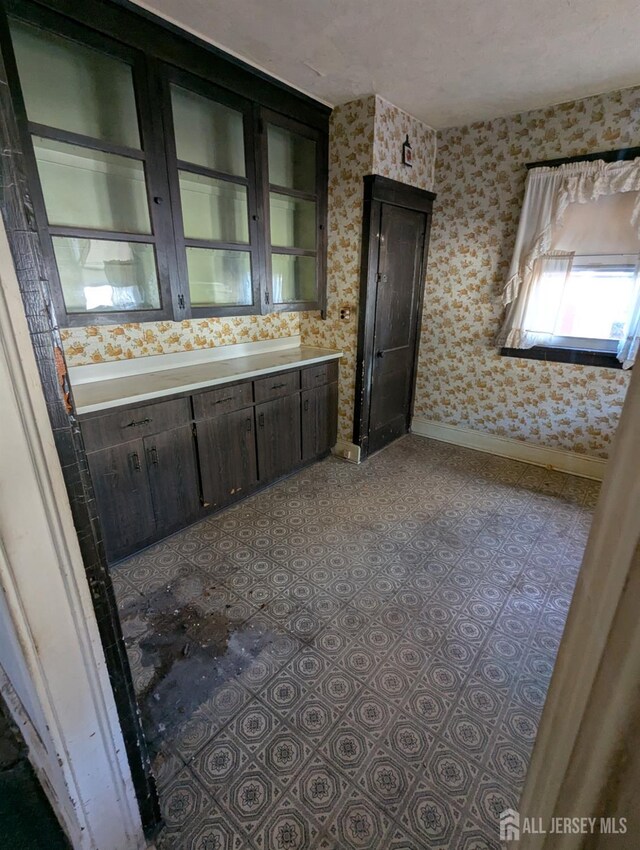 bathroom with vanity and tile patterned floors