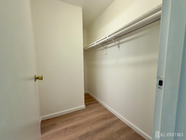 9 Lake Ave Unit 4A, East Brunswick, NJ 08816 - walk in closet with wood finished floors