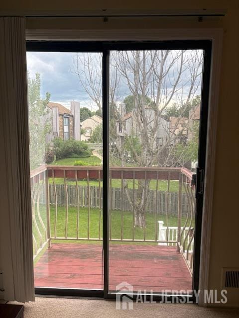 4 La Valencia Rd, Old Bridge, NJ 08857 - doorway to outside featuring carpet