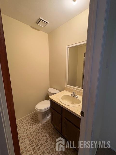 4 La Valencia Rd, Old Bridge, NJ 08857 - bathroom with vanity, toilet, and baseboards