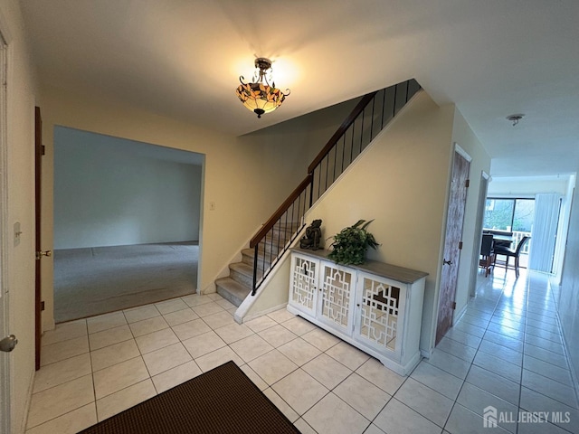 4 La Valencia Rd, Old Bridge, NJ 08857 - stairway with tile patterned floors and baseboards