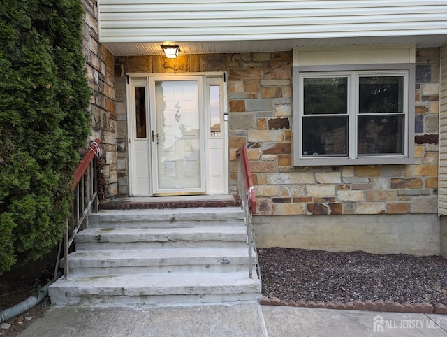 4 La Valencia Rd, Old Bridge, NJ 08857 - property entrance featuring stone siding