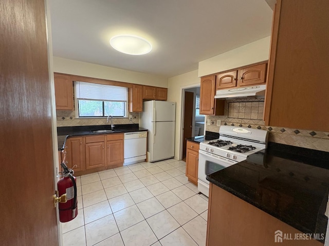 4 La Valencia Rd, Old Bridge, NJ 08857 - kitchen featuring white appliances, under cabinet range hood, backsplash, and light tile patterned floors