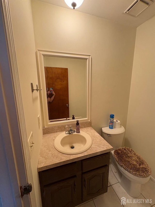 4 La Valencia Rd, Old Bridge, NJ 08857 - bathroom with vanity, toilet, and tile patterned flooring