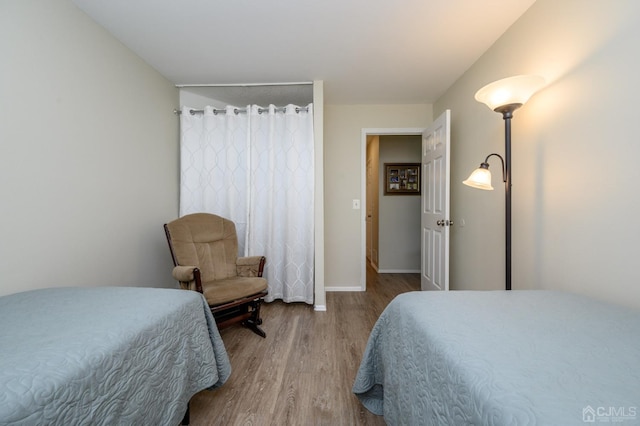 3002 Lighthouse Ln, Sayreville, NJ 08859 - bedroom with wood finished floors and baseboards