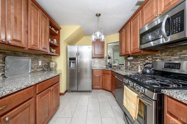 3002 Lighthouse Ln, Sayreville, NJ 08859 - kitchen featuring appliances with stainless steel finishes, tasteful backsplash, brown cabinetry, and light stone counters