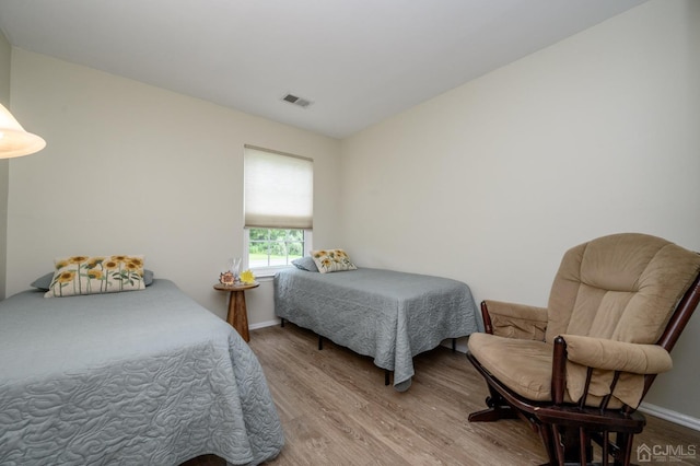 3002 Lighthouse Ln, Sayreville, NJ 08859 - bedroom featuring wood finished floors and baseboards