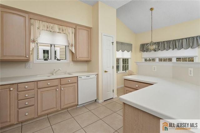 31 Cameron Ct, Monroe, NJ 08831 - kitchen with dishwasher, a sink, lofted ceiling, light tile patterned floors, and light countertops