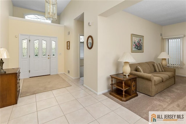31 Cameron Ct, Monroe, NJ 08831 - entrance foyer with light tile patterned floors, baseboards, and light carpet