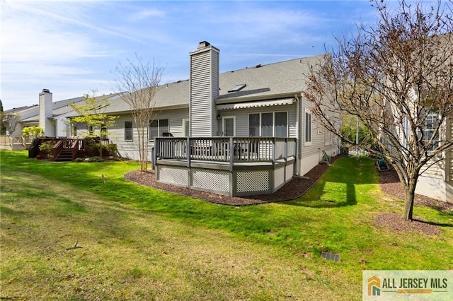 31 Cameron Ct, Monroe, NJ 08831 - back of house featuring a deck, a lawn, a chimney, and a shingled roof