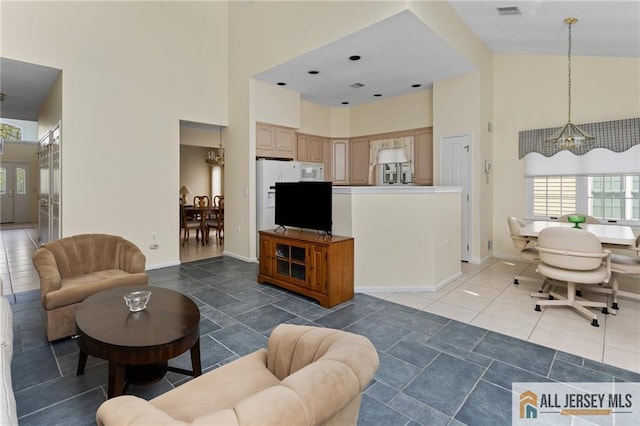 31 Cameron Ct, Monroe, NJ 08831 - living room with a high ceiling and baseboards