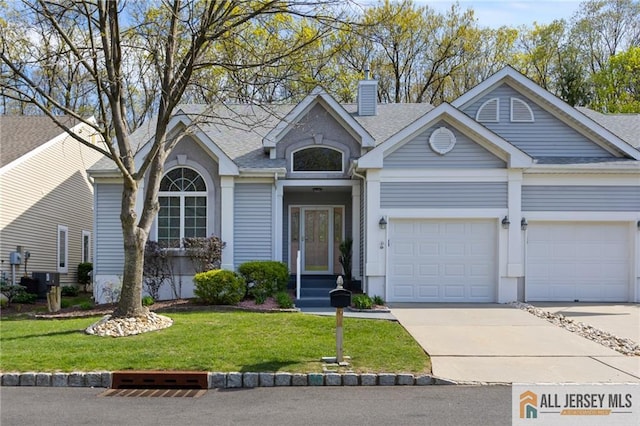 31 Cameron Ct, Monroe, NJ 08831 - single story home featuring a garage, a chimney, driveway, and a front lawn