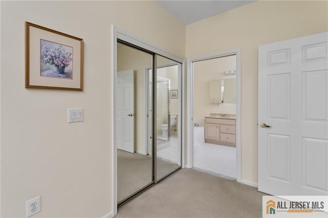 31 Cameron Ct, Monroe, NJ 08831 - hallway featuring light carpet and baseboards