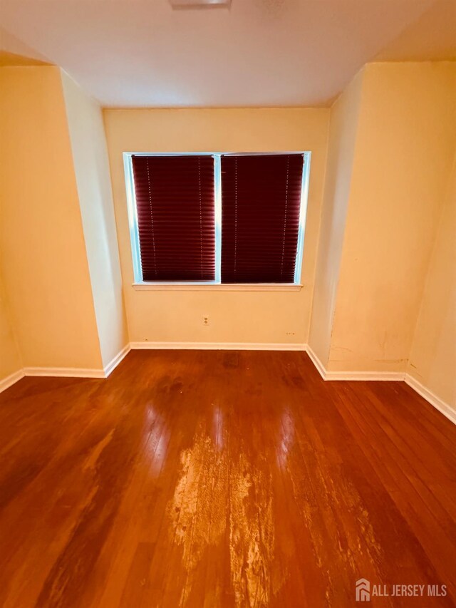 404 Newport Ct, Fords, NJ 08863 - spare room featuring hardwood / wood-style floors and baseboards