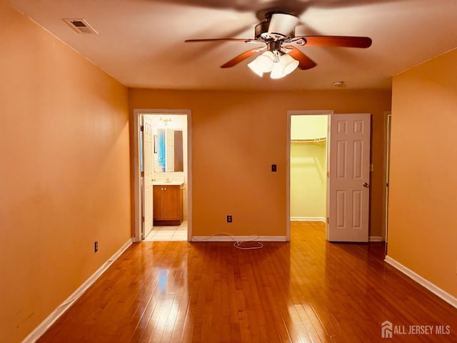 404 Newport Ct, Fords, NJ 08863 - empty room featuring hardwood / wood-style flooring, baseboards, and ceiling fan