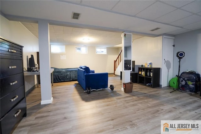 3060 Bordentown Ave, Old Bridge, NJ 08859 - living area with wood finished floors and stairway