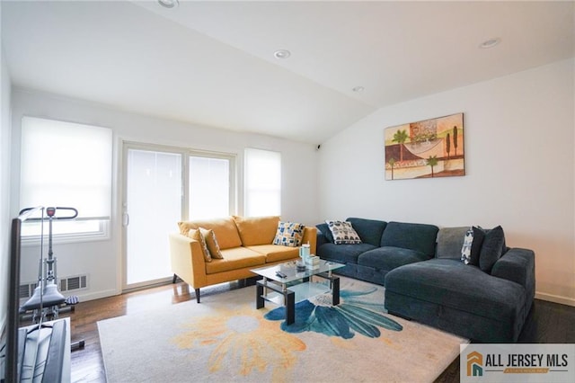 3060 Bordentown Ave, Old Bridge, NJ 08859 - living room featuring wood finished floors, lofted ceiling, and baseboards