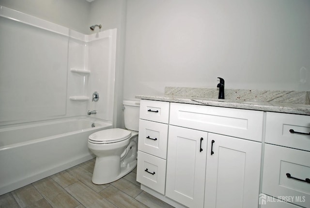 54 Castle Pointe Blvd, Piscataway, NJ 08854 - bathroom with vanity, toilet, washtub / shower combination, and wood tiled floors