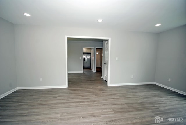 54 Castle Pointe Blvd, Piscataway, NJ 08854 - spare room with baseboards, wood finished floors, and recessed lighting