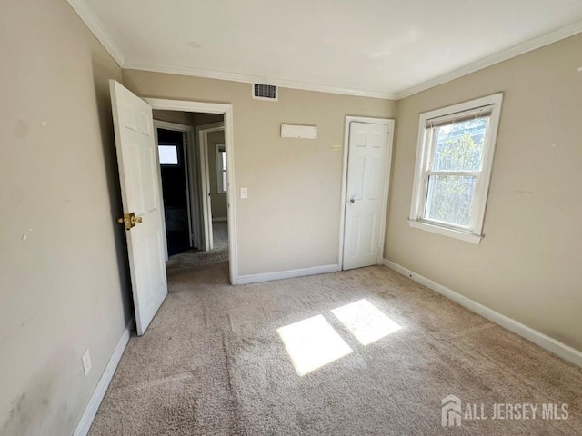 130 Maple Pl S, Plainfield, NJ 07080 - unfurnished bedroom featuring carpet flooring, baseboards, and crown molding