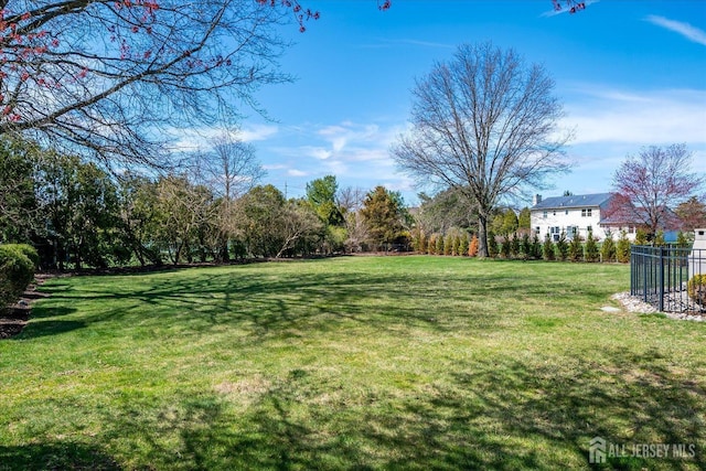 view of yard with fence