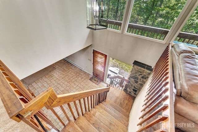 34 Stony Brook Rd, Blairstown, NJ 07825 - staircase featuring plenty of natural light, wood finished floors, and a towering ceiling