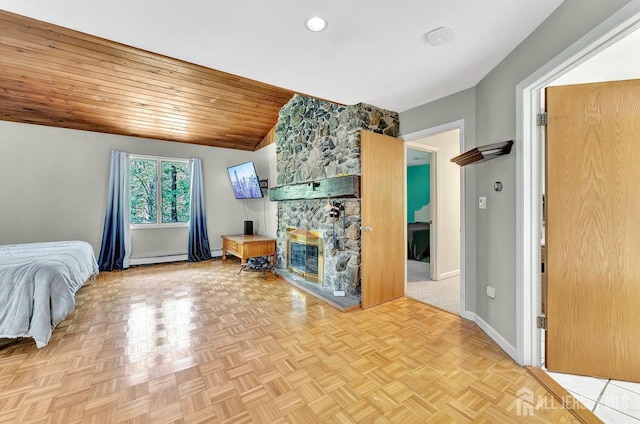 34 Stony Brook Rd, Blairstown, NJ 07825 - bedroom featuring baseboard heating, a stone fireplace, lofted ceiling, and wood ceiling