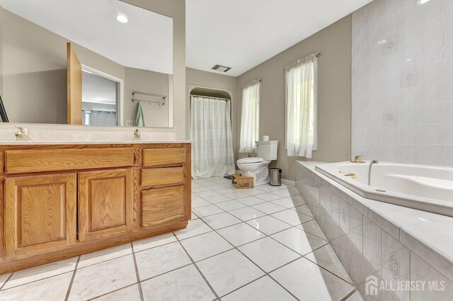 34 Stony Brook Rd, Blairstown, NJ 07825 - bathroom with tile patterned flooring, a relaxing tiled tub, and vanity