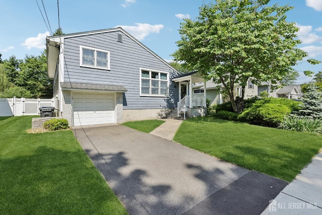 11 Beechwood Ave, Metuchen, NJ 08840 - split level home featuring a garage and concrete driveway