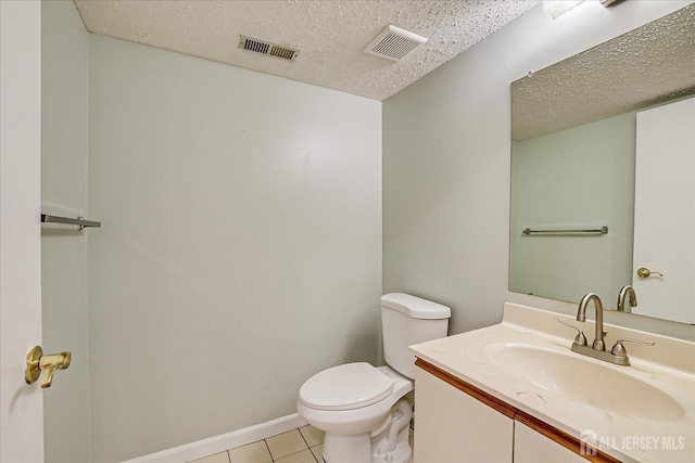 68 Kelly Dr, Edison, NJ 08820 - bathroom with a textured ceiling, vanity, and tile patterned floors
