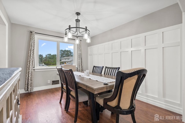 31 Brunswick Dr, Howell, NJ 07731 - dining space featuring a chandelier and dark wood-style flooring