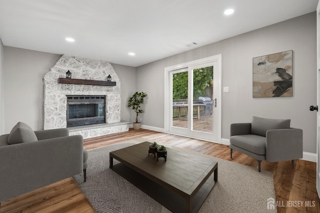 31 Brunswick Dr, Howell, NJ 07731 - living room featuring wood finished floors, a fireplace, and recessed lighting