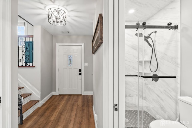 31 Brunswick Dr, Howell, NJ 07731 - foyer entrance featuring wood finished floors, stairway, and a chandelier