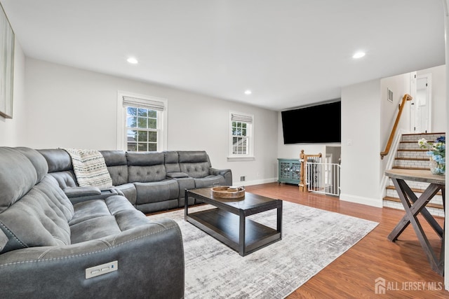 31 Brunswick Dr, Howell, NJ 07731 - living room featuring wood finished floors, recessed lighting, and stairway