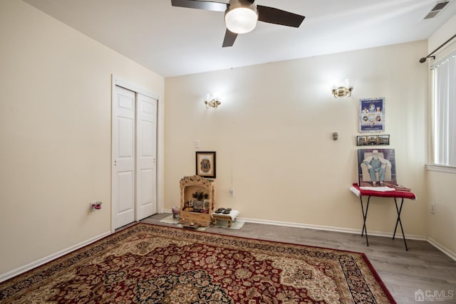 interior space featuring ceiling fan and light hardwood / wood-style floors