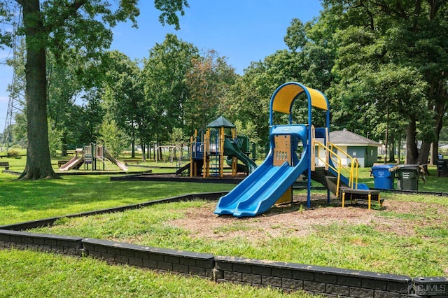 view of play area featuring a lawn