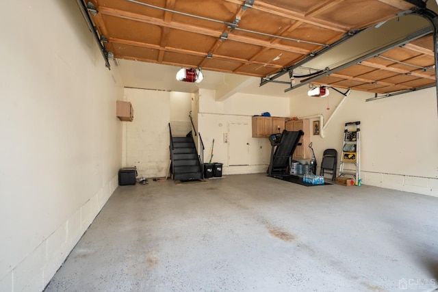 garage featuring a garage door opener