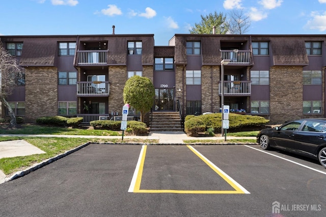 1724 Country Mill Dr, East Windsor, NJ 08512 - view of apartment building / complex with uncovered parking
