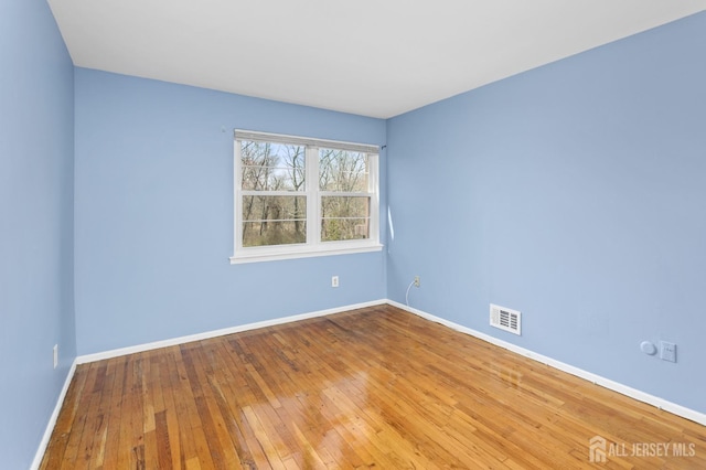 1724 Country Mill Dr, East Windsor, NJ 08512 - unfurnished room featuring baseboards and hardwood / wood-style floors
